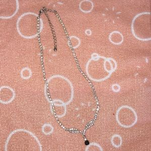 Silver diamond necklace with black pendant